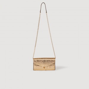 Sandro Gold leather clutch bag Gold | SN-SDO64855