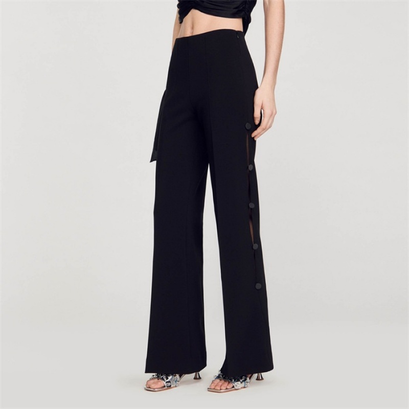 Sandro Flared trousers with cutaway sides Black | SN-SDO64796