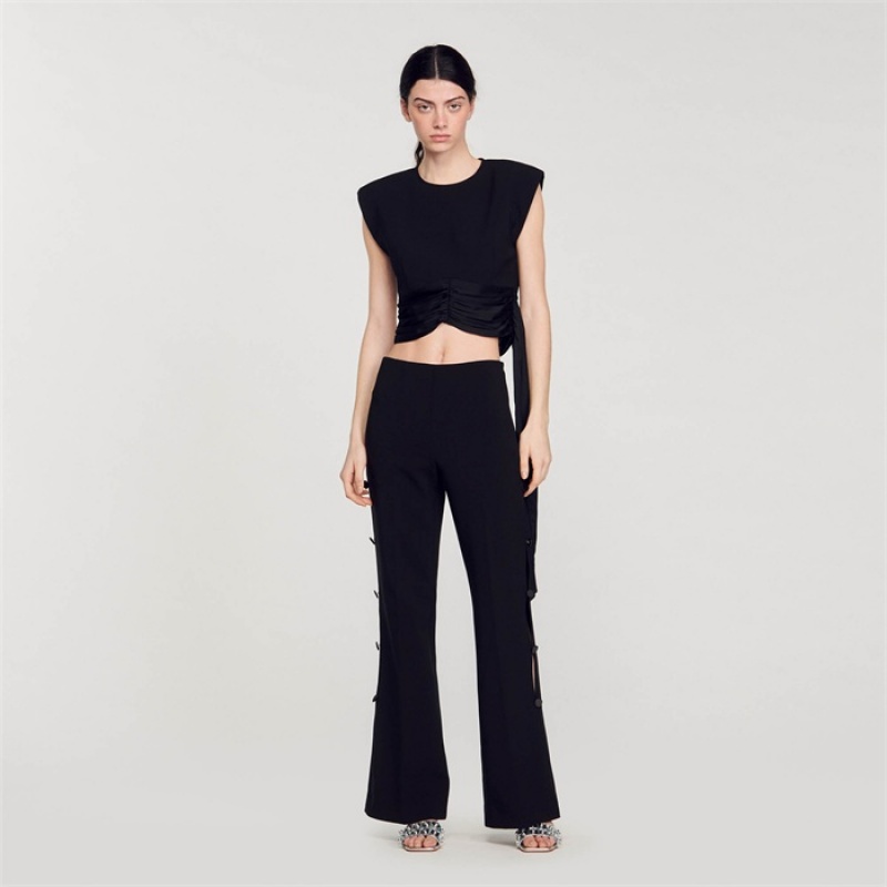 Sandro Flared trousers with cutaway sides Black | SN-SDO64796