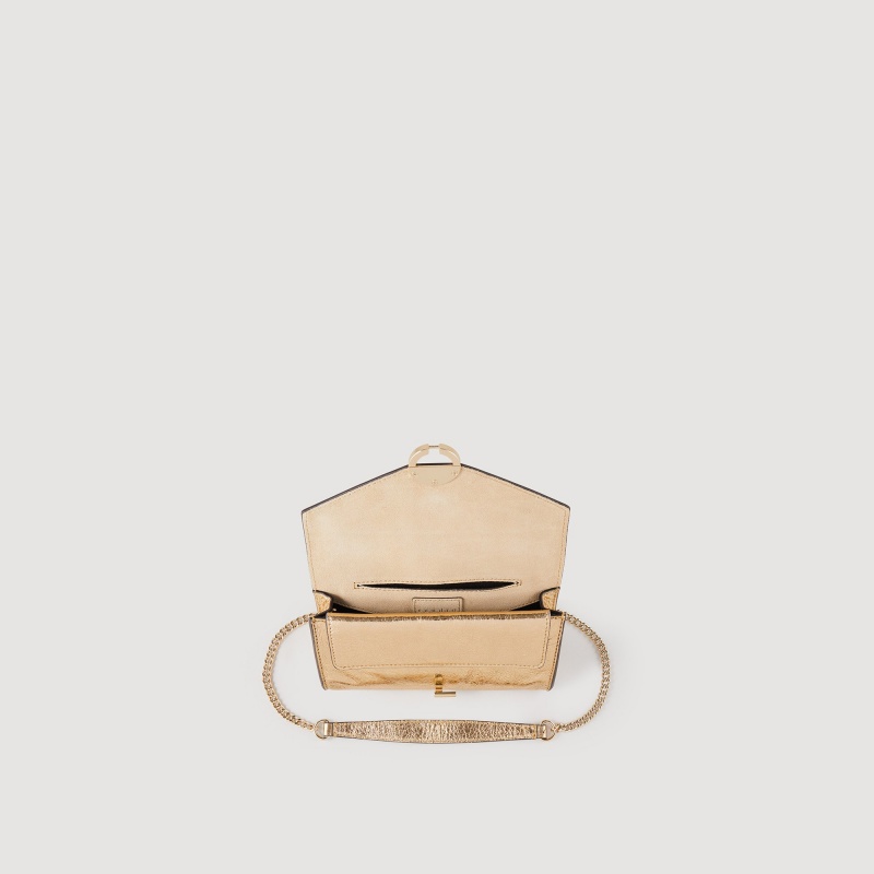 Sandro Gold leather clutch bag Gold | SN-SDO64855