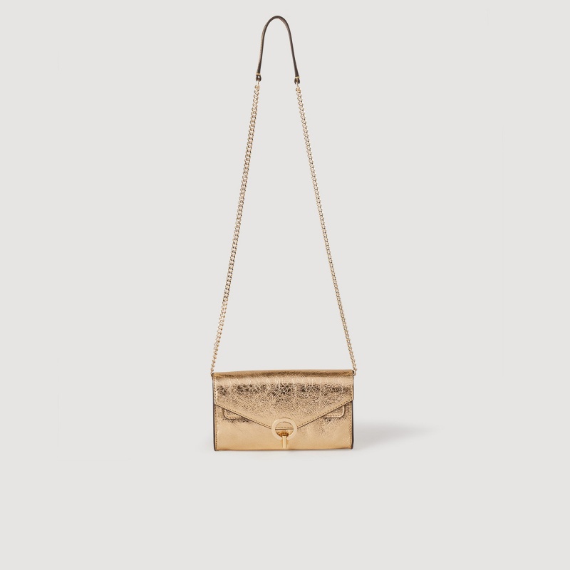 Sandro Gold leather clutch bag Gold | SN-SDO64855