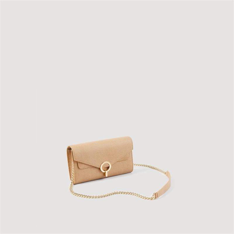 Sandro Yza Pocket clutch bag Beige | SN-SDO64845